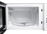 Danby 1.1 Cu. Ft. Countertop Microwave - White - DBMW1121BWW | Four à micro-ondes de comptoir Danby de 1,1 pi3 - blanc - DBMW1121BWW | DBMW11WW